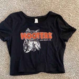 Cropped Hooters t-shirt.